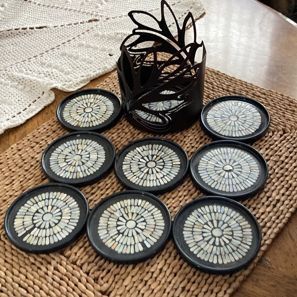 Vintage I updated this item of a set  a 10 coasters and tray to hold them